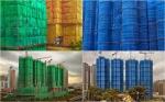 Buildings Under Construction Wrapped in Colorful Fabric