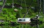 swinging couch over lake