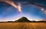 milky way over field, italy